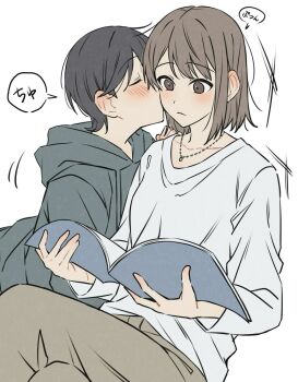 2girls adversarial_noise black_hair blush brown_eyes brown_hair brown_pants closed_eyes closed_mouth commentary_request grey_hoodie highres holding holding_magazine hood hoodie jewelry kiss kissing_cheek magazine_(object) moonbell multiple_girls necklace original pants shirt short_hair simple_background sitting speech_bubble translation_request white_background white_shirt yuri