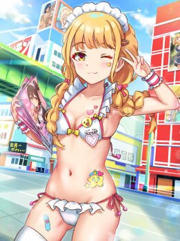 1girl :3 bikini blonde_hair braid breast_tattoo breasts city closed_mouth commentary_request cowboy_shot day facial_mark frilled_bikini frills fujita_kotone gakuen_idolmaster hand_up hatsumi-chan_(gakuen_idolmaster) heart heart_sticker heart_tattoo highres holding idolmaster koaya long_hair looking_at_viewer maid maid_bikini maid_headdress navel one_eye_closed outdoors side-tie_bikini_bottom solo standing star_(symbol) star_facial_mark sticker stomach_tattoo swimsuit tattoo thighhighs twin_braids unconventional_maid v white_bikini white_thighhighs yellow_eyes