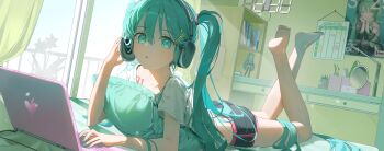 1girl :o absurdres aqua_eyes aqua_hair bare_legs barefoot bedroom black_shorts book commentary computer desk feet feet_up figure fortissimo hair_ornament hand_on_headphones hatsune_miku headphones highres incredibly_absurdres indoors laptop legs long_hair looking_at_viewer lying mirror musical_note musical_note_hair_ornament nun_nu on_bed on_stomach open_mouth plant revision shelf shirt shorts soles solo the_pose toes twintails very_long_hair vocaloid white_shirt window