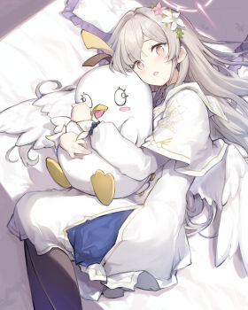 1girl black_pantyhose blue_archive blush brown_eyes commentary_request dress feet_out_of_frame flower from_side grey_hair hair_flower hair_ornament halo highres long_hair looking_at_viewer lying miya_kazutomo nagisa_(blue_archive) on_side pantyhose peroro_(blue_archive) pillow very_long_hair white_dress white_wings wings