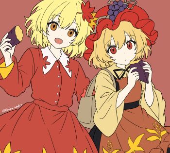 2girls absurdres aki_minoriko aki_shizuha apron black_ribbon blonde_hair commentary_request food grape_hat_ornament hair_ornament highres holding holding_food leaf leaf_hair_ornament long_sleeves looking_at_viewer maple_leaf medium_hair multiple_girls neck_ribbon open_mouth orange_apron orange_eyes red_background red_eyes red_shirt red_skirt ribbon saika_blossom shirt siblings simple_background sisters skirt smile touhou twitter_username wide_sleeves yellow_shirt
