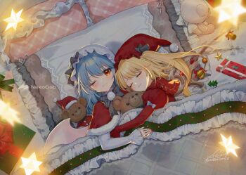 2girls ;) alternate_costume bat_wings bed blanket blonde_hair blue_hair bow box capelet closed_eyes closed_mouth commentary_request flandre_scarlet gift gift_box gotoh_(nekocat) grey_bow hat highres hug juliet_sleeves long_hair long_sleeves looking_at_viewer lying mob_cap multiple_girls on_back on_bed one_eye_closed one_side_up pillow puffy_sleeves red_capelet red_eyes red_hat red_nails remilia_scarlet siblings sisters smile star_(symbol) stuffed_animal stuffed_toy teddy_bear touhou under_covers white_hat wings