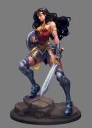 Rule 34 | 1girl, armlet, armored boots, black hair, blue eyes, boots, circlet, dc comics, full body, gold armlet, grey background, highres, holding, holding shield, holding sword, holding weapon, joe madureira, long hair, rock, shield, simple background, solo, standing, sword, vambraces, weapon, wonder woman