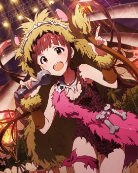 1girl animal_ears animal_print bone breasts card_(medium) cleavage dress fire fur_trim holding idolmaster idolmaster_million_live! idolmaster_million_live!_theater_days jewelry leopard_print matsuda_arisa microphone necklace official_art open_mouth palm_tree red_eyes red_hair solo stage_lights tree twintails volcano