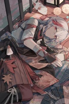 1boy ahoge amulet armor asymmetrical_sleeves bandaged_arm bandages black_footwear closed_mouth crossed_bangs eyelashes fingerless_gloves folding_fan genshin_impact gloves hair_between_eyes hand_fan highres indoors japanese_armor japanese_clothes kaedehara_kazuha light_smile long_hair looking_at_viewer lying male_focus mask multicolored_hair nokoya on_side red_eyes samurai shoulder_armor sode solo streaked_hair tassel white_hair