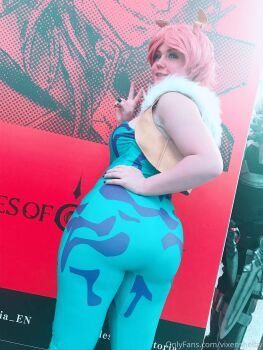 1girl absurdres artist_name ashido_mina ashido_mina_(cosplay) ass boku_no_hero_academia colored_skin cosplay cosplay_photo female_focus hand_on_own_hip highres horns huge_ass looking_to_the_side onlyfans photo_(medium) pink_hair pink_skin real_life smile solo vixenshelby watermark web_address yellow_horns