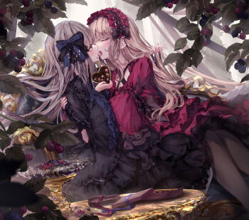 2girls black_dress black_leggings black_pantyhose blonde_hair blue_bow bow chocolate dress food french_kiss fruit gothic_lolita hair_ornament hairband head_tilt heart highres hug imminent_kiss imminent_lick imminent_licking kiss leaning_back leaning_on_person leggings licking licking_another&#039;s_face lolita_fashion long_sleeves missile228 multiple_girls outdoors pantyhose platinum_hair puffy_long_sleeves puffy_sleeves red_dress scarlet_dress silver_hair tongue_kiss yuri yuri_kiss