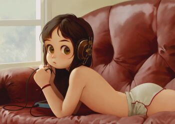 1girl alkemanubis ass blush brown_eyes couch day female_focus grey_shorts headphones highres indoors loli looking_at_viewer lying mp3_player on_stomach original short_hair short_shorts shorts solo topless_female