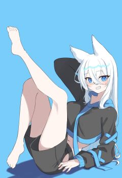 1girl absurdres animal_ears arm_behind_head barefoot black_shorts blue_background blue_eyes blush collarbone commentary_request crop_top hair_between_eyes highres jinggun korean_commentary legs legs_up long_sleeves looking_at_viewer lying on_back original shorts simple_background smile solo teeth white_hair