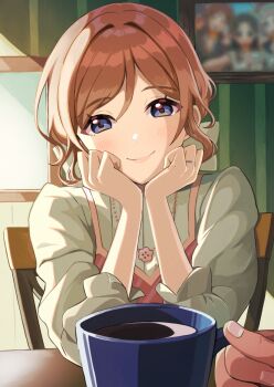 1boy 1girl annotated blush brown_hair chair coffee commentary_request cup dress fingernails gakuen_idolmaster hands_on_own_cheeks hands_on_own_face himesaki_rinami holding holding_cup idolmaster indoors jewelry kuma_(gaph5274) looking_at_viewer necklace on_chair photo_(object) picture_frame pinafore_dress pink_dress pov pov_across_table pov_hands purple_eyes ring shirt sitting sleeveless sleeveless_dress smile wedding_ring white_shirt