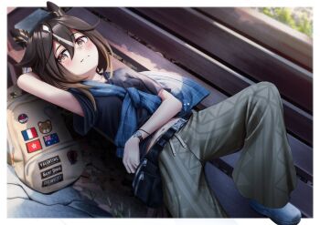 1girl absurdres animal_ears australian_flag backpack bag bench black_hair black_shirt blue_shirt blush brown_eyes brown_hair camouflage camouflage_pants casual closed_mouth ear_covers fanny_pack french_flag hair_between_eyes highres hong_kong_regional_flag horse_ears horse_girl horse_tail long_hair looking_at_viewer lying manjo_(warito) multicolored_hair navel on_back on_bench outdoors pants shirt smile stay_gold_(casual)_(umamusume) stay_gold_(umamusume) streaked_hair tail umamusume white_hair