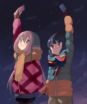 2girls agaki_anko arm_above_head beanie black_hat blue_eyes blue_hair blue_hat blue_jacket blue_scarf blue_shorts blush brown_gloves brown_pants brown_pantyhose brown_scarf cellphone closed_mouth cowboy_shot double-parted_bangs down_jacket gloves green_scarf hair_between_eyes hat highres holding holding_hands holding_phone jacket kagamihara_nadeshiko long_sleeves multicolored_jacket multiple_girls night open_mouth orange_jacket orange_scarf outdoors pants pantyhose phone pink_hair pink_jacket pom_pom_(clothes) pom_pom_beanie purple_eyes red_scarf scarf shima_rin shorts sky smartphone star_(sky) starry_sky striped_clothes striped_scarf two-tone_jacket yurucamp