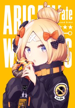 1girl :o abigail_williams_(fate) abigail_williams_(traveling_outfit)_(fate) animal-themed_food bandaid bandaid_on_face bandaid_on_forehead belt black_bow black_jacket blonde_hair blue_eyes bow character_name chocolate_donut commentary_request copyright_name crossed_bandaids donut enpera fate/grand_order fate_(series) food forehead from_side hair_bow hair_bun high_collar holding holding_donut holding_food jacket long_sleeves looking_at_viewer multiple_hair_bows orange_belt orange_bow parted_bangs polka_dot polka_dot_bow saine scarf single_hair_bun sleeves_past_wrists solo upper_body yellow_background