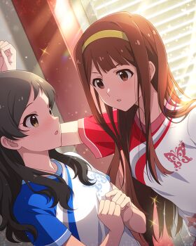2girls breasts brown_eyes brown_hair commentary_request dutch_angle eye_contact game_cg hairband hands_up idolmaster idolmaster_million_live! idolmaster_million_live!_theater_days indoors kabedon kitazawa_shiho lesson_wear_(idolmaster_million_live!) long_hair looking_at_another multiple_girls official_art shirt short_sleeves sparkle sunlight t-shirt tanaka_kotoha third-party_source upper_body yellow_hairband yuri