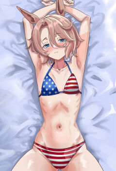 1girl american_flag american_flag_bikini american_flag_print animal_ears armpits arms_up bikini blue_eyes blush brown_hair commentary_request flag_print flag_print_bikini flat_chest heart heart-shaped_pupils highres horse_ears looking_at_viewer lying narita_taishin_(umamusume) narrow_waist petite print_bikini shikibara_fukka solo sweat swimsuit symbol-shaped_pupils umamusume