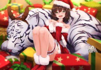 1girl 1other animal aoi_erika bare_shoulders black_hair box breasts brown_hair byakko_(heaven_burns_red) christmas christmas_present commentary_request gift gift_box green_eyes hat heaven_burns_red looking_at_viewer lying_on_animal medium_breasts santa_hat thighhighs tiger yanikura