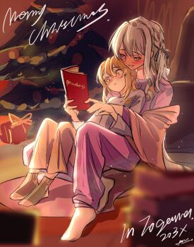 2girls bang_dream! bang_dream!_it's_mygo!!!!! blonde_hair blue_hair blush book chinese_commentary christmas_tree commentary_request hair_between_eyes hero45439083942 highres holding holding_book long_hair mother_and_daughter multiple_girls open_mouth original pajamas pants purple_pants purple_shirt shirt sidelocks sitting togawa_hazuki togawa_sakiko yellow_eyes