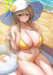 Rule 34 | 1girl, absurdres, beach, beach towel, bikini, blonde hair, blue archive, breasts, cleavage, closed mouth, collarbone, commentary request, day, erorange, flower, green eyes, hair ornament, hat, hat flower, highres, innertube, large breasts, long hair, navel, nonomi (blue archive), nonomi (swimsuit) (blue archive), ocean, official alternate costume, outdoors, sand, sidelocks, smile, solo, sun hat, swim ring, swimsuit, towel, white hat, yellow bikini, yellow flower