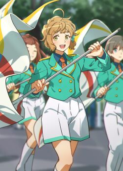 Rule 34 | 1boy, 2girls, blonde hair, blue shirt, blurry, brown hair, depth of field, flag, fuyuhino, green eyes, green jacket, hair ornament, hibike! euphonium, highres, holding, holding flag, jacket, kawashima sapphire, kenzaki ririka, looking at viewer, marching band, multiple girls, necktie, orange necktie, pants, shirt, skirt, smile, tsukinaga motomu, white pants, white skirt