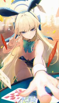 1girl animal_ears aqua_bow aqua_bowtie blonde_hair blue_archive blue_eyes blue_hairband blue_halo blue_leotard bow bowtie breasts card cleavage coin commentary_request detached_collar fake_animal_ears gold_coin hairband halo highleg highleg_leotard highres koyuuuuuuuuuuu large_breasts leaning_forward leotard long_hair looking_at_viewer official_alternate_costume playboy_bunny playing_card rabbit_ears reaching reaching_towards_viewer solo strapless strapless_leotard ten_of_hearts thighhighs thighs toki_(blue_archive) toki_(bunny)_(blue_archive) w white_thighhighs white_wrist_cuffs wrist_cuffs