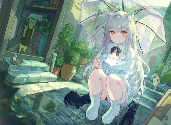 1girl :3 animal_ears arl bell black_panties blush boots breasts cat cat_ears cat_girl cleavage cleavage_cutout clothing_cutout day dress full_body grey_hair hair_ornament hairclip highres jingle_bell long_hair looking_at_viewer original outdoors panties pantyshot plant potted_plant puddle rubber_boots shadow solo squatting transparent transparent_umbrella umbrella underwear white_boots white_dress yellow_eyes