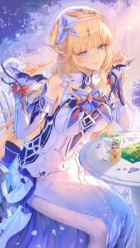 1girl bare_shoulders beret blonde_hair blue_eyes chair closed_mouth commentary_request cross-shaped_pupils detached_sleeves dress facial_mark falling_petals food forehead_mark genshin_impact gumo_(911tf5) hat highres jagarico jean_(genshin_impact) leaning_forward long_hair looking_at_viewer nicole_(genshin_impact) pantyhose petals pointy_ears sitting smile solo symbol-shaped_pupils table varka_(genshin_impact) white_dress white_hat white_pantyhose white_sleeves wide_sleeves