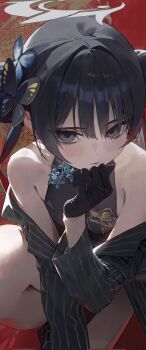 1girl bare_shoulders black_gloves black_hair blue_archive blush butterfly_hair_ornament chinese_commentary closed_mouth commentary_request dragon_print gloves grey_eyes hair_bun hair_ornament halo hand_on_own_chin highres kisaki_(blue_archive) knee_up looking_at_viewer modare off_shoulder pinstripe_pattern solo