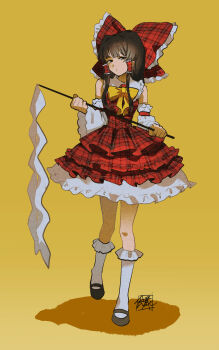 1girl absurdres adapted_costume bow brown_hair commentary dress gohei hair_bow hakurei_reimu highres holding holding_gohei lolita_fashion plaid_clothes plaid_dress red_bow red_dress sokura_(mochichitose) solo sweet_lolita touhou yellow_background