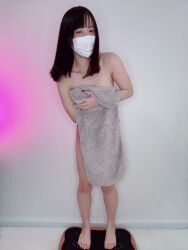 1girl animated asian barefoot black_hair face_mask full_body hinkonhima indoors jewelry long_hair looking_at_viewer mask naked_towel necklace nude one-piece_swimsuit real_life solo sound standing swimsuit teasing towel undressing video