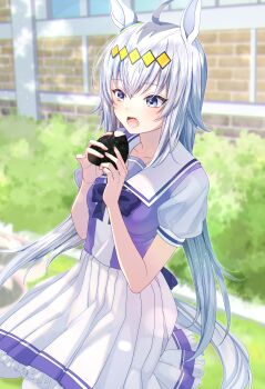 1girl absurdres animal_ears blush bow bowtie brick_wall commentary_request dappled_sunlight diamond_(shape) ear_ornament food frilled_skirt frills grey_hair hairband hana_arare highres holding holding_food horse_ears horse_girl horse_tail horseshoe_ornament long_hair multicolored_hair oguri_cap_(umamusume) onigiri open_mouth outdoors pleated_skirt puffy_short_sleeves puffy_sleeves purple_bow purple_bowtie purple_shirt sailor_collar sailor_shirt school_uniform shirt short_sleeves skirt solo streaked_hair sunlight tail tracen_school_uniform umamusume white_sailor_collar white_skirt