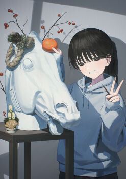 1girl 2026 absurdres black_eyes black_hair commentary_request food fruit highres holding holding_pencil hood hooded_jacket hoodie horse jacket long_hair long_sleeves orange_(fruit) original pencil puffy_sleeves sculpture smile table teeth tokaki v