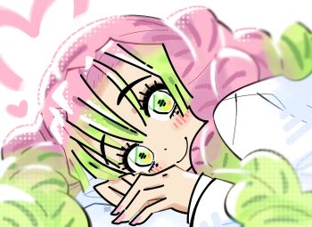 bourbunbun braid close-up commentary demon_slayer_uniform drawn_heart gradient_hair green_eyes green_hair halftone highres kanroji_mitsuri kimetsu_no_yaiba lying mole mole_under_each_eye mole_under_eye multicolored_hair multiple_braids multiple_moles on_stomach pink_hair portrait tri_braids