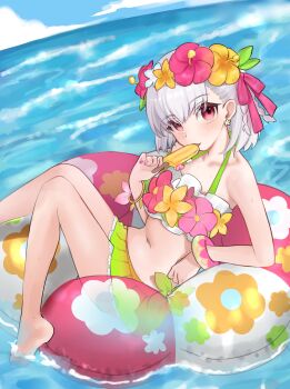 1girl absurdres bare_shoulders bikini blush breasts fate/grand_order fate_(series) flower_wreath food green_bikini hair_ribbon hashtag-only_commentary head_wreath highres innertube kama_(fate) kama_(first_ascension)_(fate) kama_(swimsuit_avenger)_(first_ascension)_(fate) kama_(young)_(fate) looking_at_viewer mikon_(nicknqme) miniskirt navel ocean popsicle rainbow_skirt red_eyes ribbon short_hair skirt small_breasts solo swim_ring swimsuit thighs white_hair