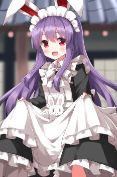 1girl :d alternate_costume animal_ears apron apron_hold black_dress blurry blurry_background blush bow bowtie collared_dress commentary_request cowboy_shot dress enmaided eyes_visible_through_hair frilled_apron frilled_dress frills hair_between_eyes highres inaba_mob_(touhou) long_hair long_sleeves looking_at_viewer maid maid_apron maid_headdress open_mouth purple_hair rabbit_ears rabbit_girl red_eyes reisen_udongein_inaba ruu_(tksymkw) sidelocks skirt_hold smile solo standing touhou white_apron white_bow white_bowtie