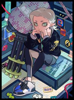 Rule 34 | 1other, androgynous, black jacket, black leggings, blue eyes, box, closed mouth, crossed ankles, elbows on knees, from above, full body, green shirt, grey hair, hands on own chin, head rest, heavy splatling deco (splatoon), high tops, highres, jacket, jellyfish print, jiuniaoshan, layered clothes, leggings, leggings under shorts, mole, mole under eye, multicolored shoes, multiple piercings, nintendo, octoling, octoling player character, on box, other focus, parted bangs, partially unzipped, print sleeves, sanpaku, shirt, shoes, short eyebrows, shorts, side part, sideways glance, sitting, sneakers, solo, splatoon (series), splatoon 2, t-shirt, two-tone leggings, white leggings