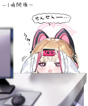 1girl amanatsu_uni animal_ear_headphones animal_ears blonde_hair blue_archive cat_ear_headphones cat_ears commentary_request computer_mouse controller crying crying_with_eyes_open fake_animal_ears fang halo headphones highres holding joystick light_blush long_sleeves momoi_(blue_archive) monitor open_mouth pink_halo red_eyes simple_background skin_fang solo speech_bubble table teardrop tearing_up tears translation_request wide_sleeves