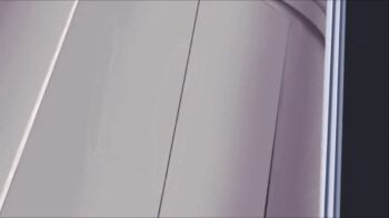 1girl animated animated_gif bare_shoulders biceps bikini breasts cleavage dark-skinned_female dark_skin female_focus gunxsword highres kick_the_door kicking large_breasts marianne_(gunxsword) microphone muscular muscular_female navel screencap short_hair solo strapless strapless_bikini swimsuit toned toned_female water yellow_bikini