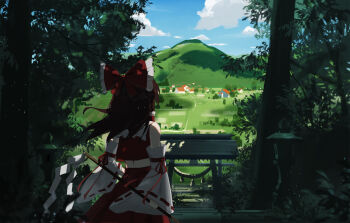 1girl blue_sky bow brown_hair cloud commentary_request day detached_sleeves facing_away frilled_bow frilled_hair_tubes frills from_behind gohei gu0st hair_bow hair_tubes hakurei_reimu highres holding holding_gohei house long_hair mountain outdoors red_bow red_skirt ribbon-trimmed_sleeves ribbon_trim skirt skirt_set sky solo stairs torii touhou