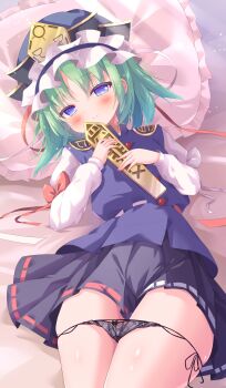 1girl absurdres bed_sheet black_panties black_skirt blue_eyes blue_vest blush commentary_request green_hair hat highres long_sleeves looking_at_viewer lying medium_hair ohitoriplayer on_back panties panties_around_thighs pillow rod_of_remorse shiki_eiki shirt side-tie_panties single_sidelock skirt smile solo thighs touhou underwear vest white_shirt