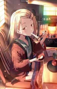 1girl black_shorts black_socks blonde_hair blush bowl chopsticks collarbone commentary_request cup food gakuen_idolmaster grey_hoodie hair_ornament hairclip highres holding holding_bowl holding_chopsticks hood hoodie idolmaster indoors kotatsu lamp long_hair long_sleeves looking_at_viewer mochi mochi_trail murasaki_himuro orange_eyes plate red_robe robe shinosawa_hiro shiruko_(food) shorts sitting socks solo stove table wariza