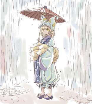 1girl animal_ear_headwear blonde_hair blue_tabard commentary fake_animal_ears fox_girl fox_tail frilled_hat frills hat holding holding_own_tail holding_umbrella kitsune kyuubi long_sleeves looking_at_viewer medium_hair mob_cap multiple_tails oil-paper_umbrella rain s-a-murai slit_pupils solo tabard tail touhou umbrella water_drop white_hat yakumo_ran yellow_eyes