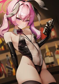 1girl absurdres alternate_costume animal_ears bar_(place) bare_shoulders black_gloves black_thighhighs black_wings blue_archive blurry blurry_background bottle bow bowtie breasts covered_navel detached_collar elbow_gloves fake_animal_ears feathered_wings gloves halo hat head_wings highleg highleg_leotard highres holding holding_bottle indoors koharu_(blue_archive) leotard long_hair looking_at_viewer mikiri pink_eyes pink_hair rabbit_ears red_bow red_bowtie see-through_clothes small_breasts solo thighhighs thighs twintails wings