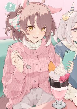 ! 2girls animal_ears blue_sweater_vest blush brown_hair cardigan cellphone dantsu_flame_(umamusume) ear_covers food grey_eyes hashtag-only_commentary highres hishi_miracle_(umamusume) holding holding_phone holding_spoon horse_ears horse_girl looking_at_viewer medium_hair multiple_girls open_mouth pants parfait phone pink_cardigan ponytail ri_cochet sidelocks smartphone spoon sweater sweater_vest umamusume white_hair white_pants white_sweater yellow_eyes