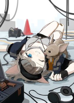 1girl almond_(arknights) animal_ears arknights bag black_gloves blue_eyes blue_jacket bone_hair_ornament breasts brown_hair commentary dog dog_ears drill feet_out_of_frame fingerless_gloves gloves grey_shirt grin hair_ornament headphones highres jacket k-yosinori knees_up looking_at_another lying medium_breasts on_back one_eye_closed shirt smile solo tongue tongue_out traffic_cone upside-down visor_cap wire