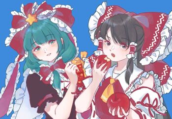 2girls apple blue_background bow christmas commentary_request food front_ponytail fruit green_eyes green_hair hakurei_reimu holding holding_food holding_fruit kagiyama_hina multiple_girls nontraditional_miko red_bow red_ribbon ribbon sagasaga touhou