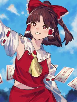 1girl arm_at_side arm_up armpit_peek ascot blue_background bow bright_pupils brown_eyes brown_hair card clenched_teeth cloud commentary_request cowboy_shot detached_sleeves floating_card frilled_bow frilled_hair_tubes frills grin hair_bow hair_tubes hakurei_reimu highres looking_at_viewer medium_hair midriff_peek oftooon outdoors partial_commentary red_bow red_skirt red_vest ribbon-trimmed_sleeves ribbon_trim skirt sky smile solo teeth touhou vest white_pupils white_sleeves yellow_ascot