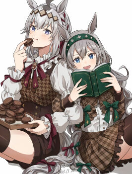 2girls ahoge alternate_costume animal_ears blue_eyes blush book bow braid breasts brown_corset brown_jacket brown_shorts brown_skirt brown_thighhighs closed_mouth corset ear_ornament eating fang food frills glutton green_bow green_hairband grey_hair grey_tail hair_between_eyes hair_ornament hair_ribbon hairband highres holding holding_book holding_food horse_ears horse_girl horse_tail jacket locked_arms long_hair long_sleeves macaron multicolored_hair multiple_girls oguri_cap_(umamusume) open_mouth red_bow red_ribbon ribbon sashiumito shirt shorts simple_background skirt smile tail tamamo_cross_(umamusume) thighhighs thighs umamusume white_shirt