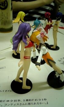 00s 6+girls apricot_sakuraba barefoot bikini blonde_hair blue_hair broccoli_(company) figure formal_clothes galaxy_angel galaxy_angel_rune kahlua_marjoram lowres multiple_girls nano-nano_pudding orange_hair photo_(medium) purple_hair red_hair skirt skirt_suit suit swimsuit tequila_marjoram tiara yuri