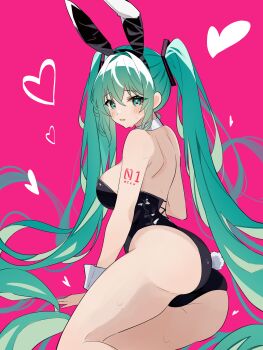1girl absurdres animal_ears aqua_eyes aqua_hair backless_outfit bare_shoulders black_leotard blush breasts coco_irasuto detached_collar fake_animal_ears fake_tail hatsune_miku highleg highleg_leotard highres large_breasts leotard long_hair looking_at_viewer looking_back number_tattoo open_mouth pink_background playboy_bunny rabbit_ears rabbit_tail simple_background strapless strapless_leotard tail tattoo twintails vocaloid wrist_cuffs