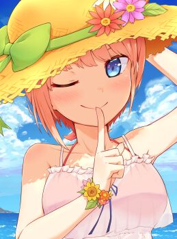 1girl ;) arm_behind_head bare_shoulders bikini blue_eyes blue_sky blush bow breasts cloud collarbone commentary dress eyebrows_hidden_by_hair eyelashes finger_to_mouth flower flower_wreath frilled_dress frills go-toubun_no_hanayome green_bow green_ribbon hat hat_bow hat_ribbon highres index_finger_raised leaf looking_at_viewer medium_breasts nakano_ichika ocean one_eye_closed pink_hair profnote purple_flower red_bikini red_flower ribbon see-through_clothes see-through_dress short_hair sidelocks sky smile solo straw_hat summer sunflower swimsuit white_dress